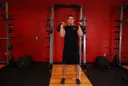 Alternating Kettlebell Press exercise