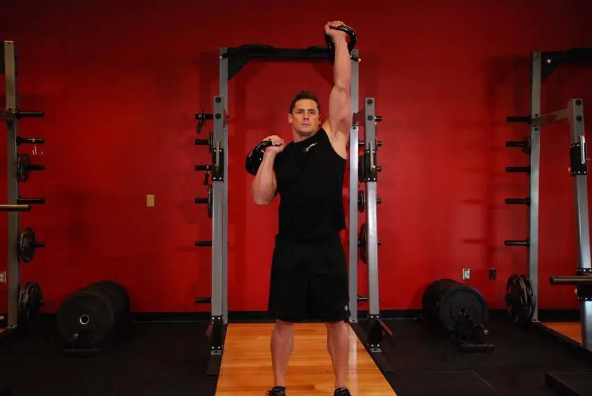 Alternating Kettlebell Press — end position