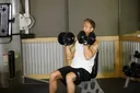 Arnold Dumbbell Press exercise