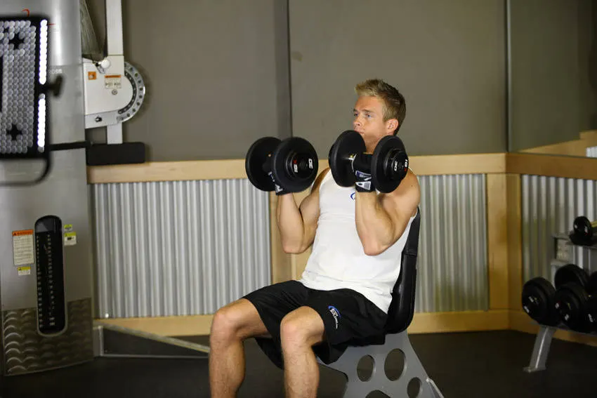 Arnold Dumbbell Press exercise