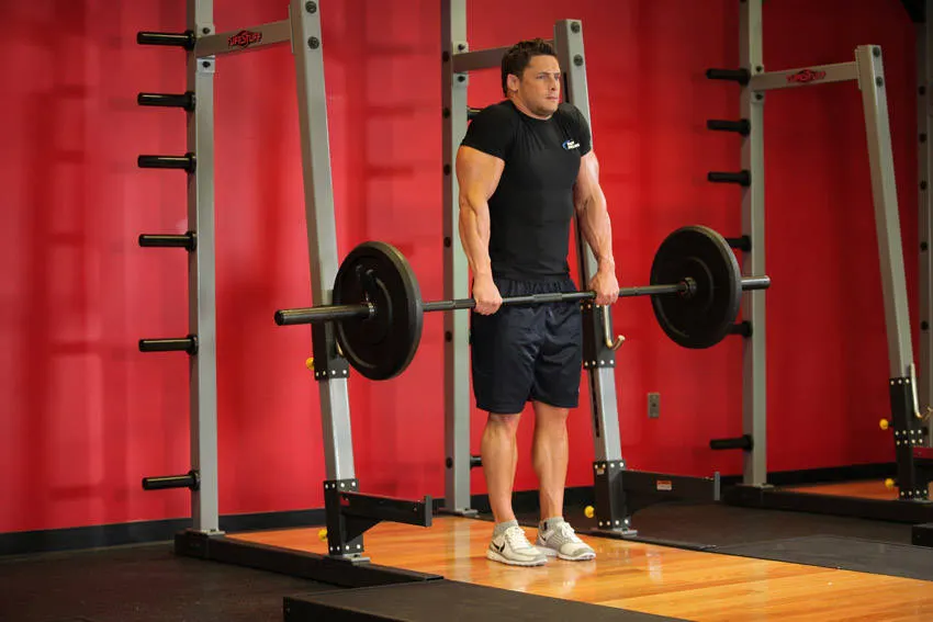 Barbell Shrug — end position