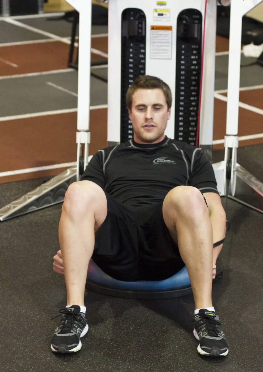 Bosu Ball Cable Crunch With Side Bends exercise