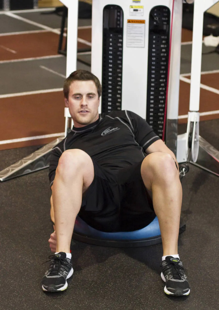 Bosu Ball Cable Crunch With Side Bends — end position