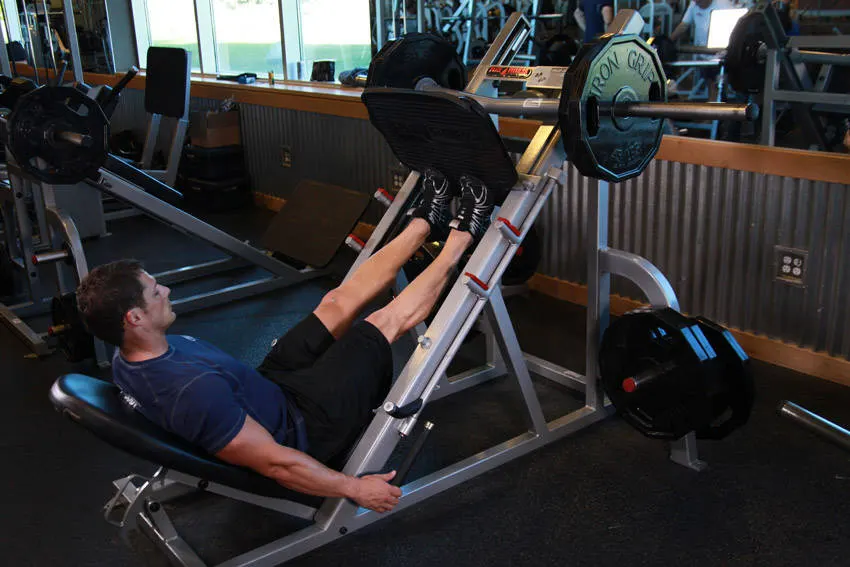 Calf Press On The Leg Press Machine — end position