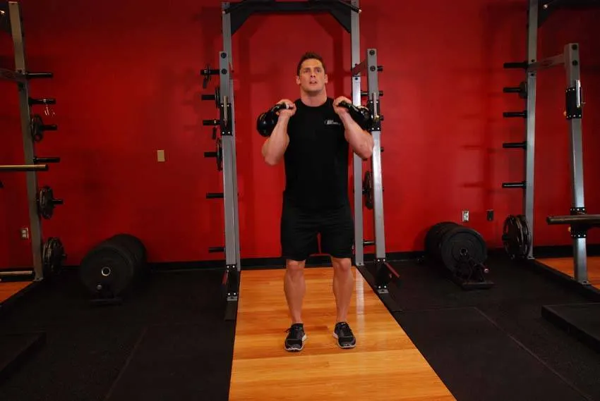 Double Kettlebell Jerk — end position