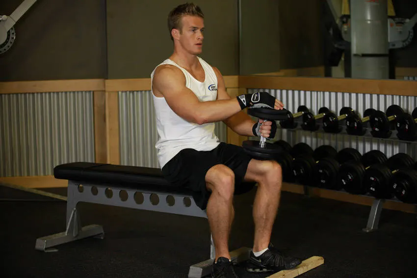 Dumbbell Seated One-Leg Calf Raise — end position
