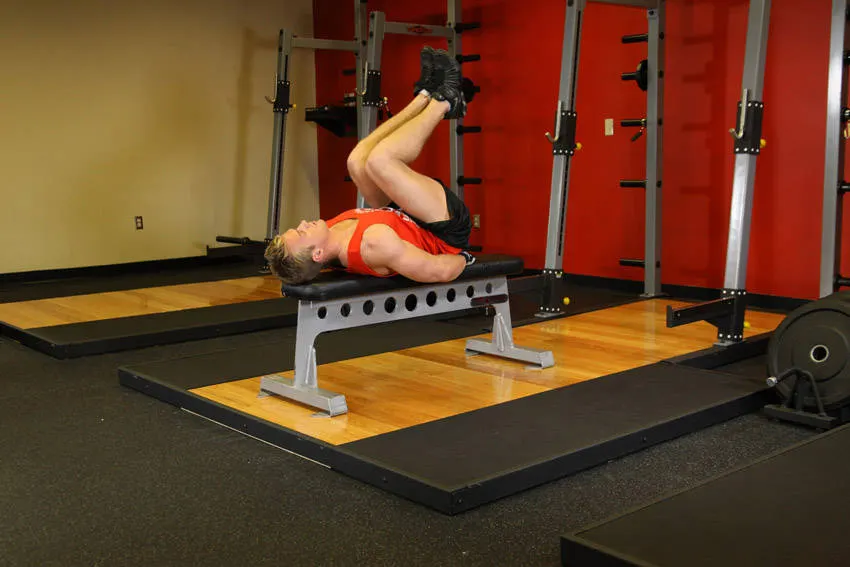 Flat Bench Leg Pull-In exercise