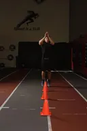 Front Cone Hops (or hurdle hops) exercise