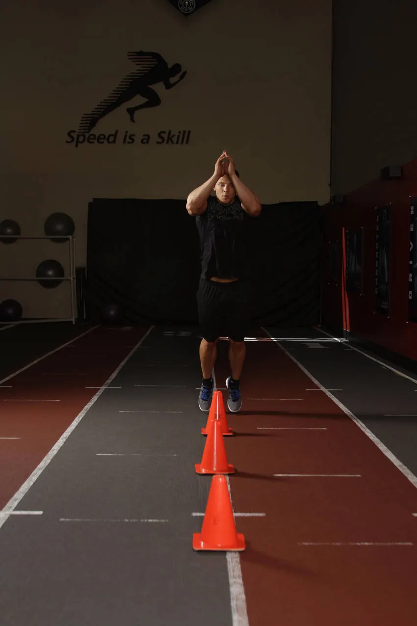 Front Cone Hops (or hurdle hops) exercise