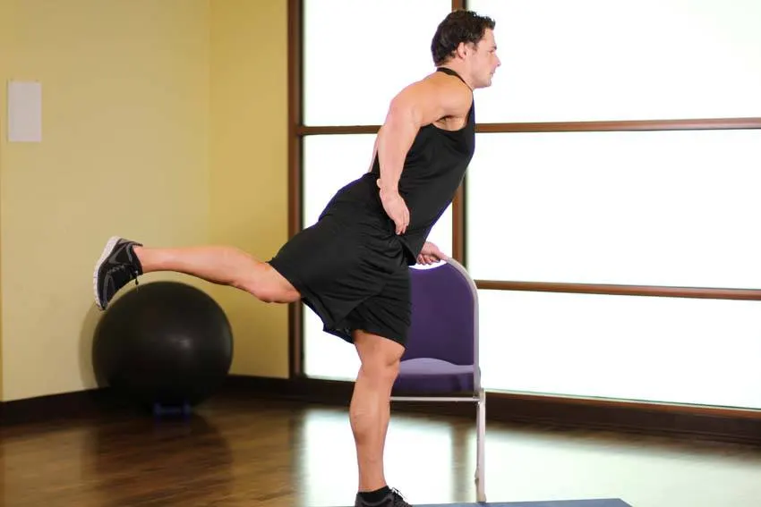 Front Leg Raises — end position