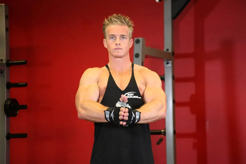 Isometric Chest Squeezes — end position