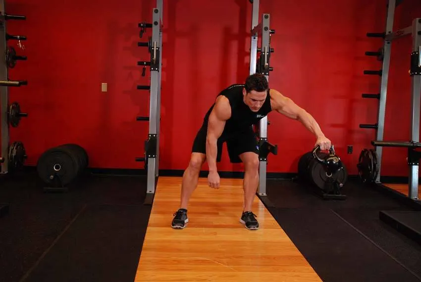 Kettlebell Pass Between The Legs exercise