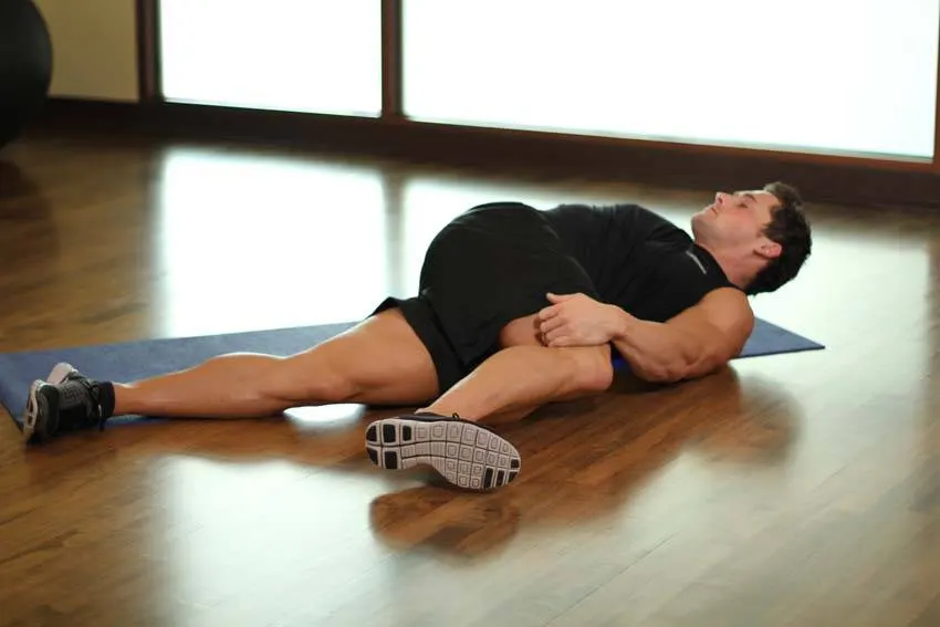 Knee Across The Body — end position