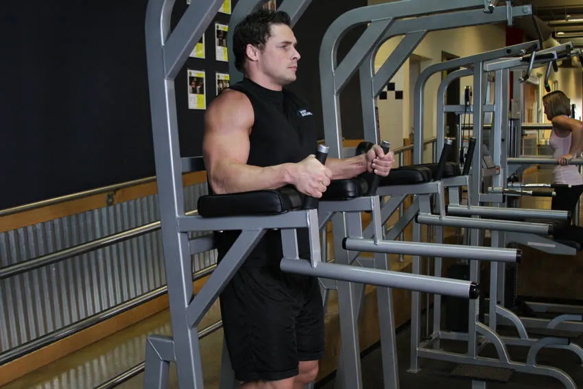 Knee/Hip Raise On Parallel Bars — starting position