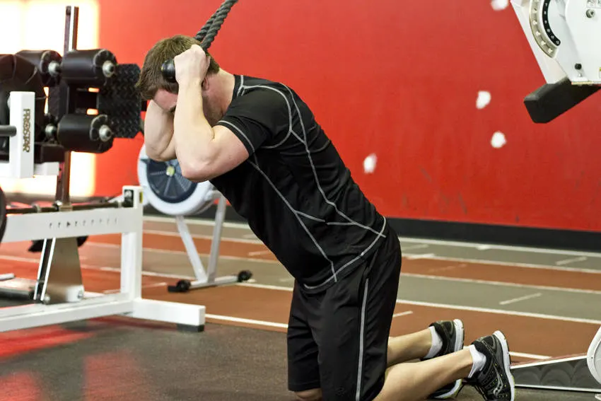 Kneeling Cable Crunch With Alternating Oblique Twists exercise