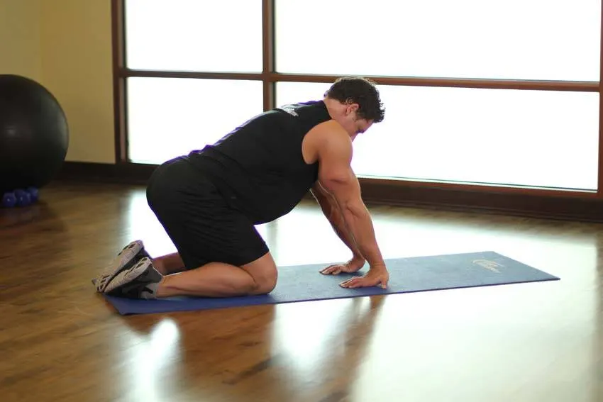 Kneeling Forearm Stretch — end position