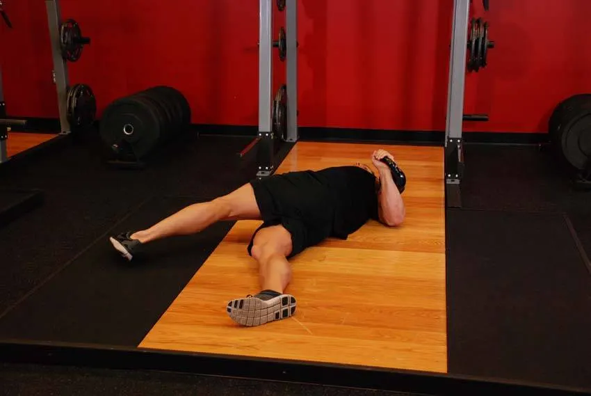Leg-Over Floor Press exercise