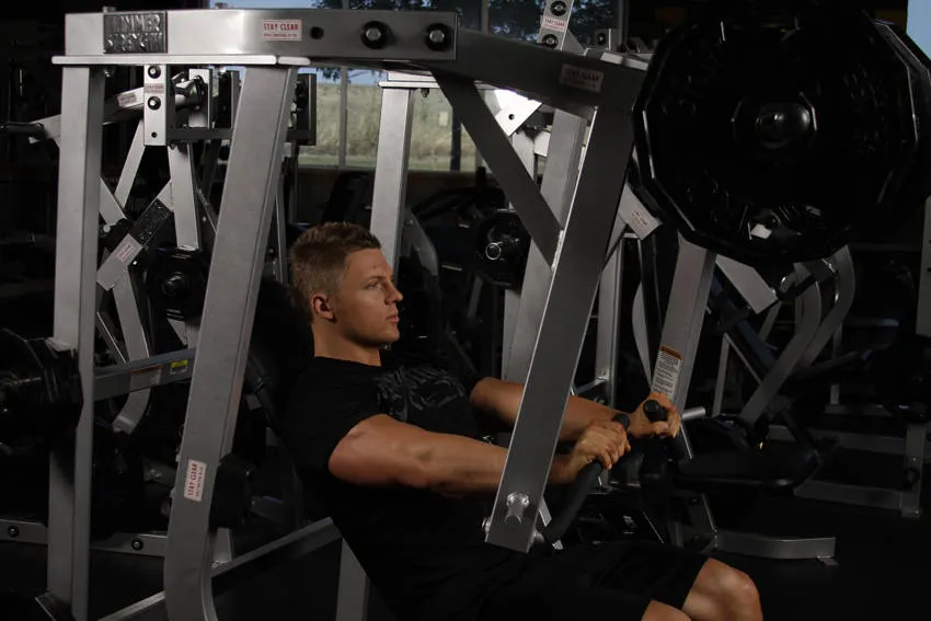 Leverage Decline Chest Press — end position