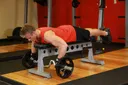 Lying Cambered Barbell Row exercise