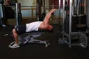 Lying Close-Grip Bar Curl On High Pulley exercise