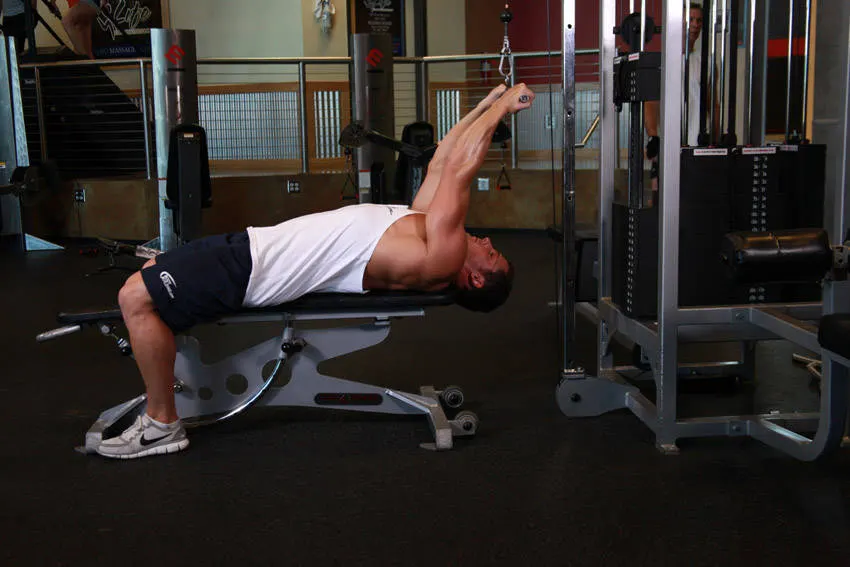 Lying Close-Grip Bar Curl On High Pulley exercise