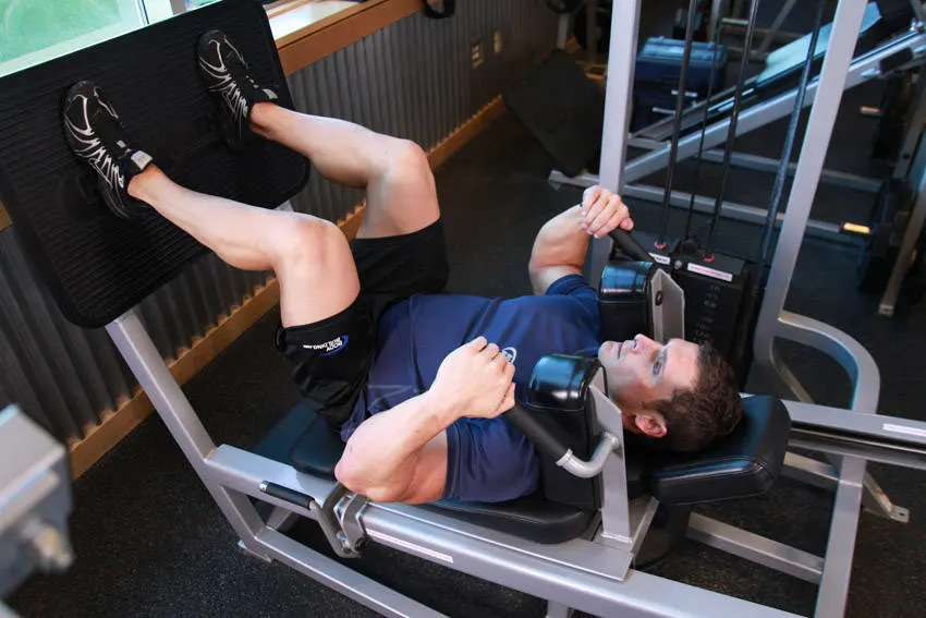Lying Machine Squat exercise