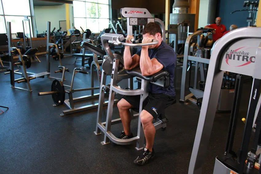 Machine Preacher Curls — end position