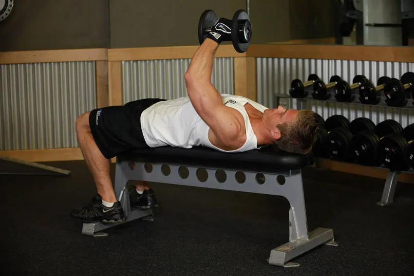 One-Arm Flat Bench Dumbbell Flye — end position