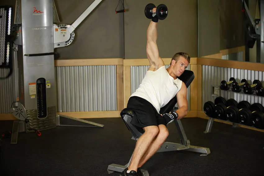 One-Arm Incline Lateral Raise — end position