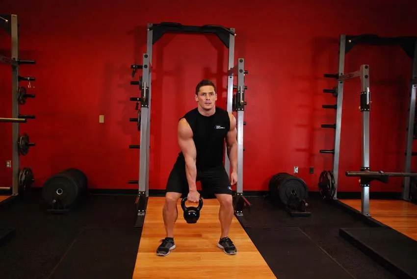 One-Arm Kettlebell Clean and Jerk exercise