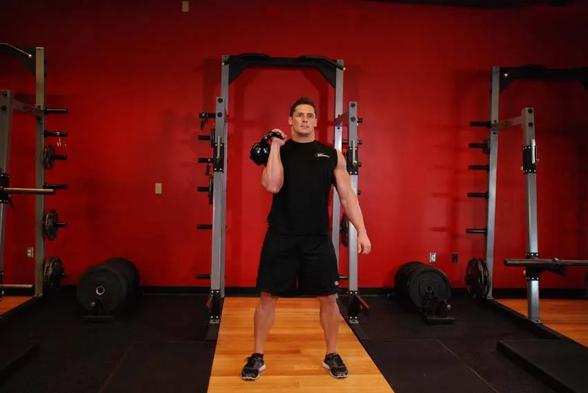 One-Arm Kettlebell Clean and Jerk — end position