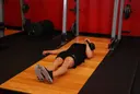 One-Arm Kettlebell Floor Press exercise