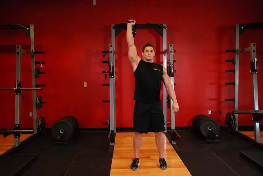 One-Arm Kettlebell Para Press — end position