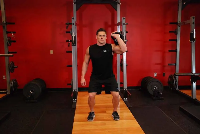 One-Arm Kettlebell Push Press — end position