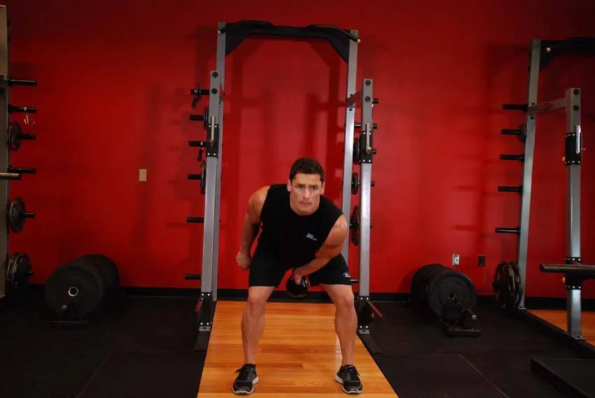 One-Arm Kettlebell Swings — end position