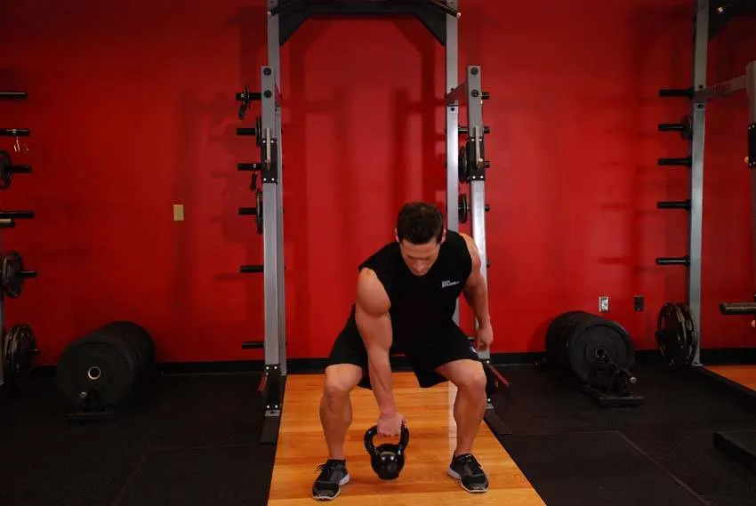 One-Arm Open Palm Kettlebell Clean exercise