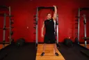 One-Arm Overhead Kettlebell Squats exercise