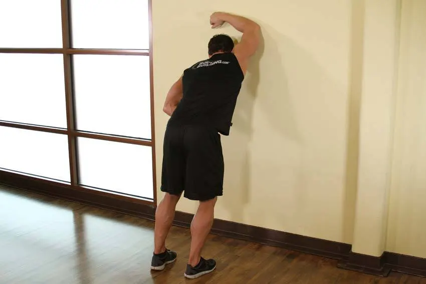 One Arm Against Wall — end position
