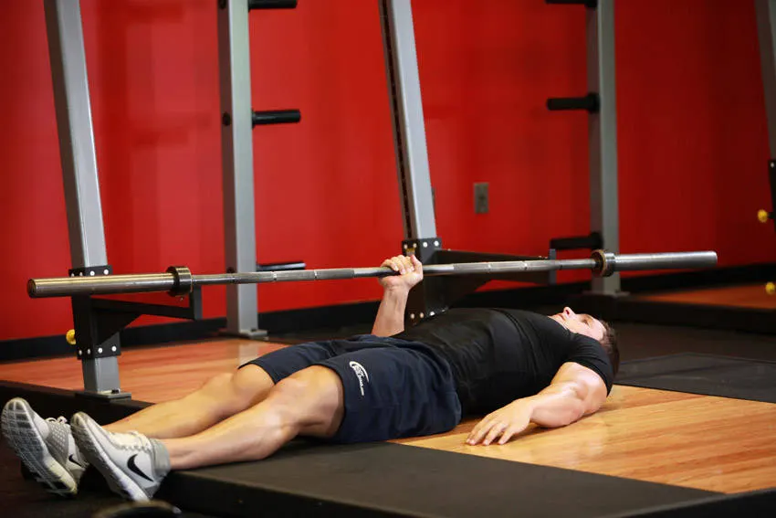 One Arm Floor Press exercise