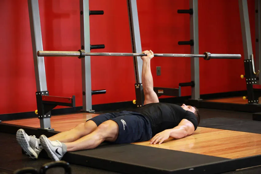 One Arm Floor Press — end position