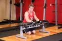 Palms-Down Wrist Curl Over A Bench exercise
