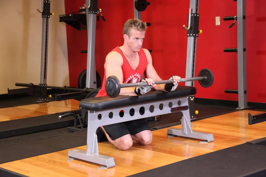 Palms-Down Wrist Curl Over A Bench — end position