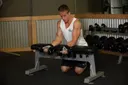 Palms-Up Dumbbell Wrist Curl Over A Bench exercise