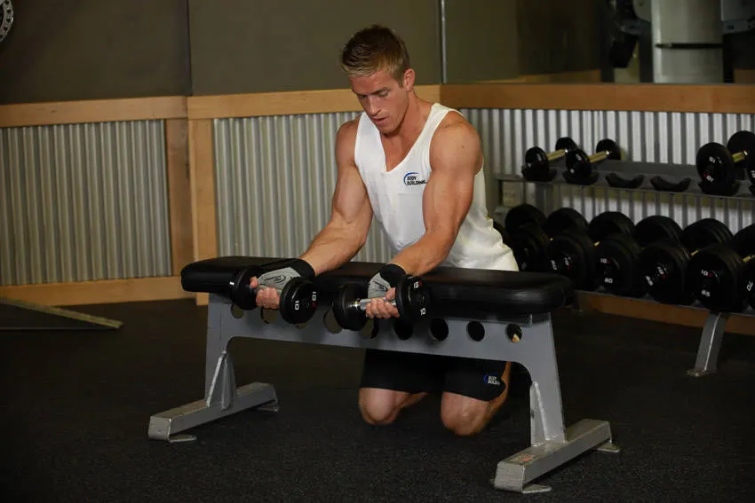 Palms-Up Dumbbell Wrist Curl Over A Bench exercise