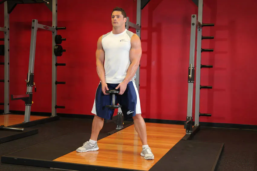 Plie Dumbbell Squat exercise