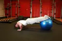 Push-Ups With Feet On An Exercise Ball exercise