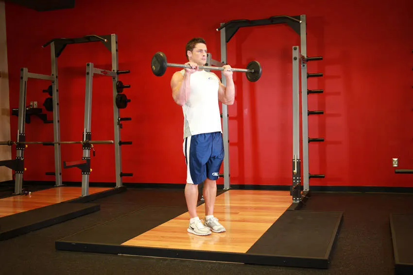 Reverse Barbell Curl — end position