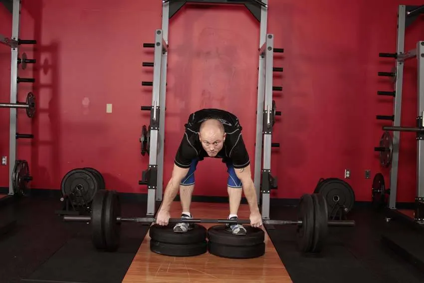 Romanian Deadlift from Deficit — end position