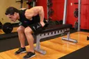 Seated Bent-Over Two-Arm Dumbbell Triceps Extension exercise