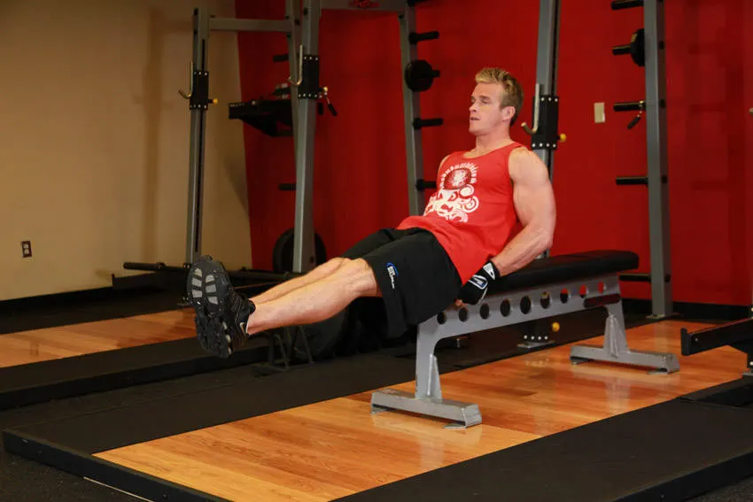 Seated Flat Bench Leg Pull-In exercise